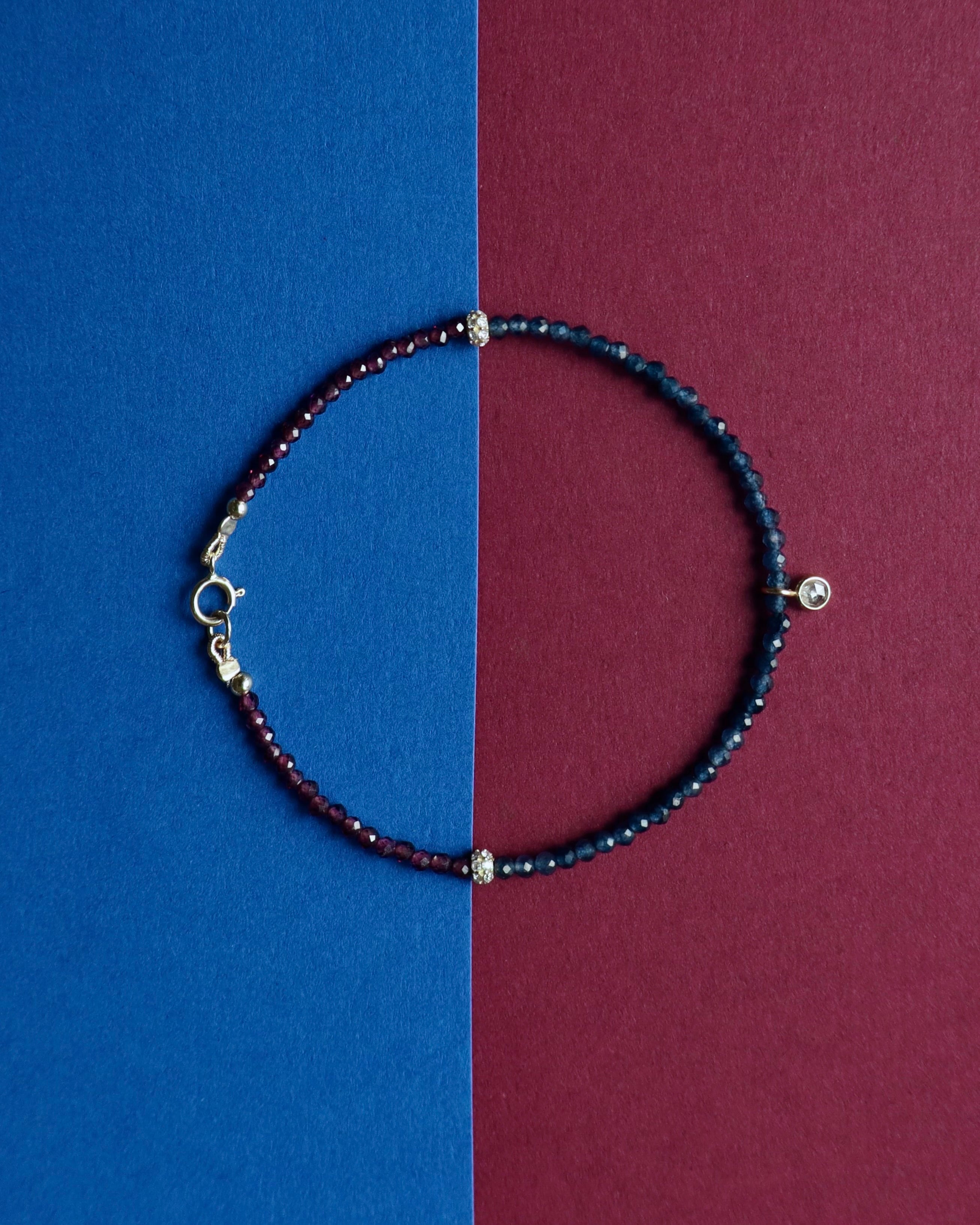 Beaded bracelet on a two-tone blue and red background